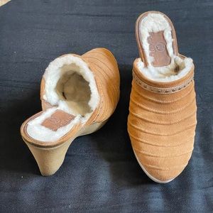 Cole Haan shearing lined suede platform mule with 4” heels and 1” platform.